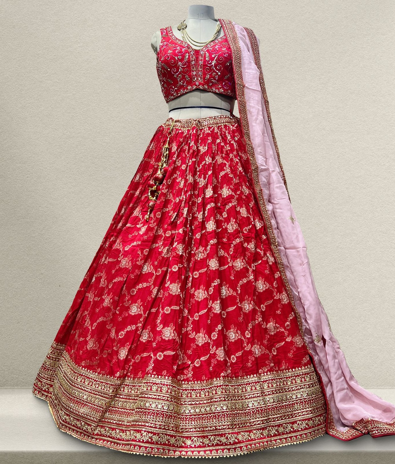 Make Your Wedding Day Truly Grand with Our Premium Bridal Lehenga Collection on Rent